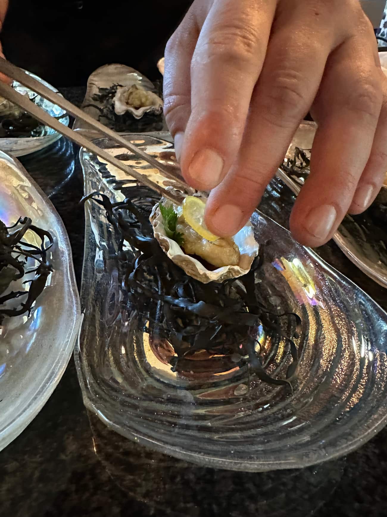Amuse-Bouche eines besonderen Menüs, von Hand angerichtet